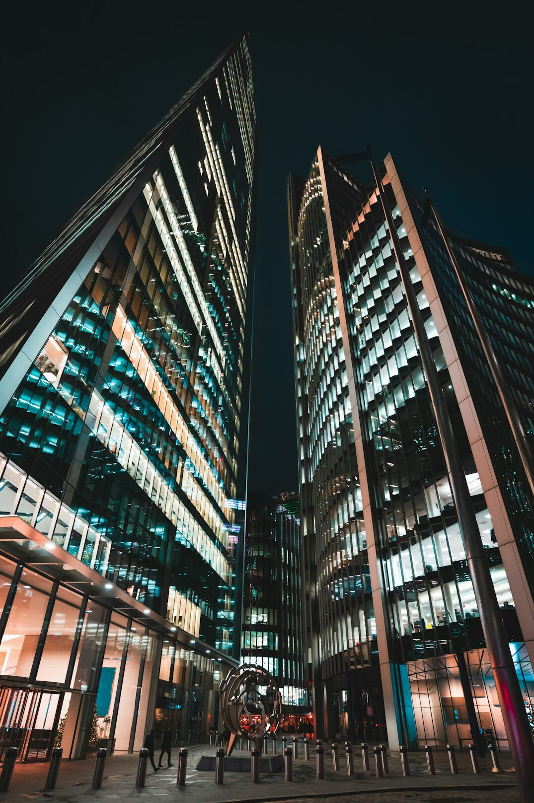 Glass office towers of a financial district at dusk